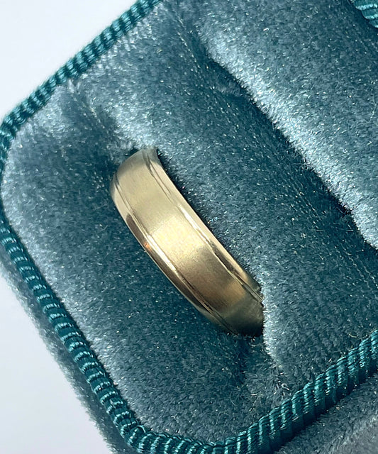 Gold textured wedding band